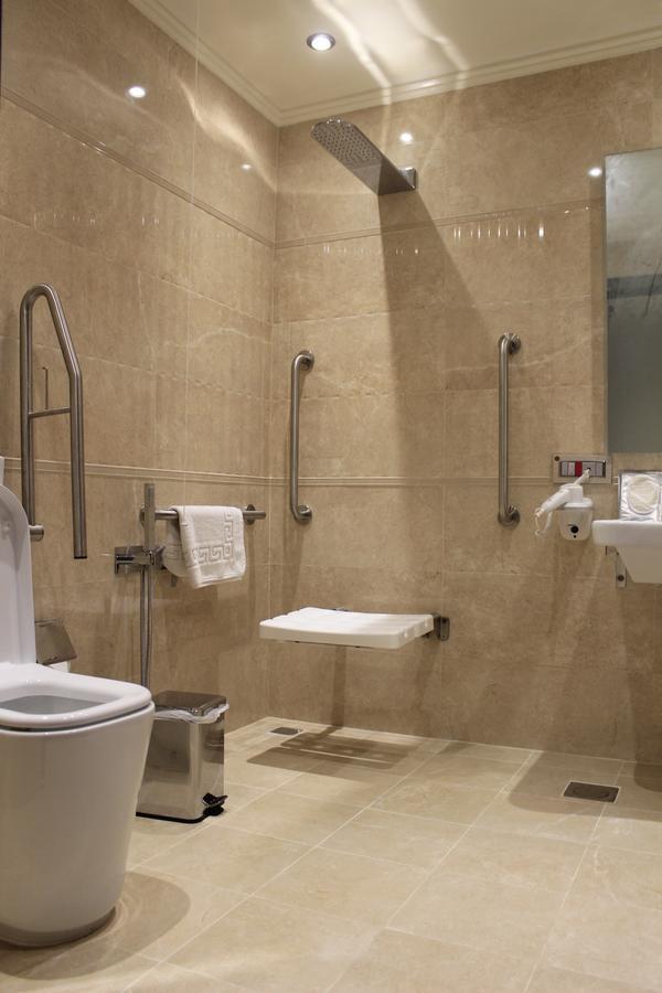 Tio Sea Resort Jor Exterior foto Disabled toilet with a folding seat